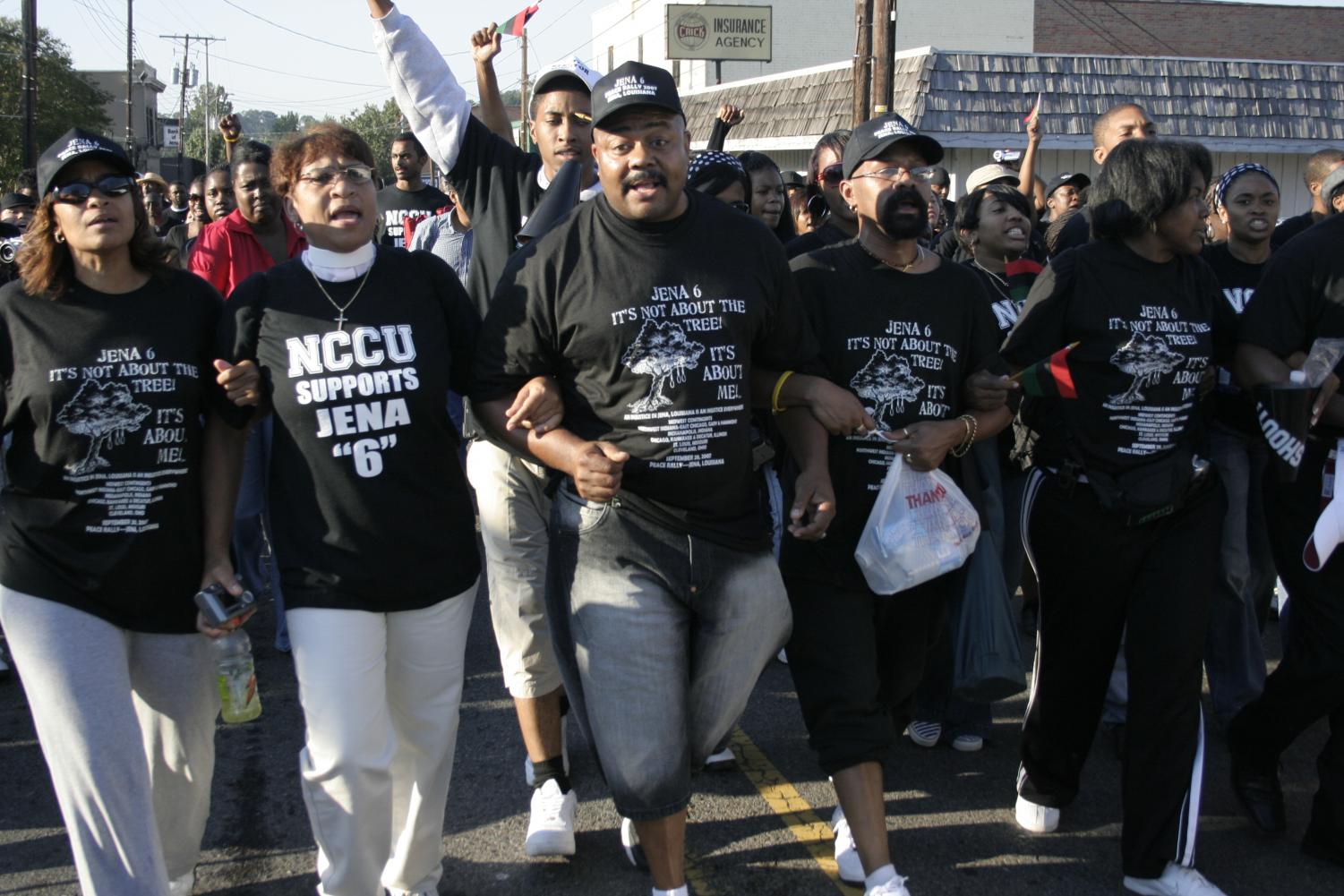 Demonstrators in Jena, La. begin Thursday's rally in unison, chanting, “We fired up, can’t take no more!”