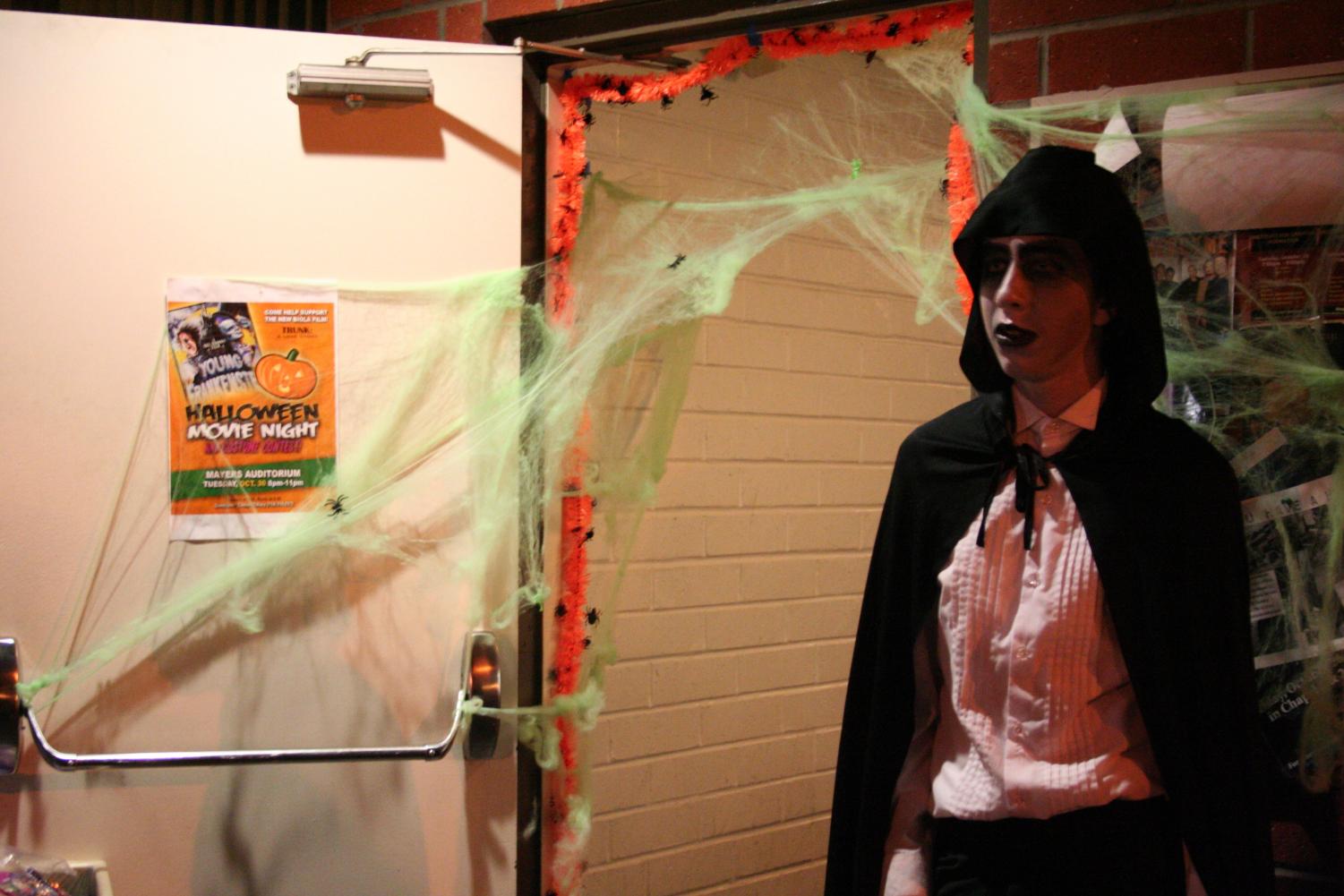 Stephen Pardini prepares for the costume contest at Tuesday's Halloween Movie Night, a fundraiser for the official Biola Film project in progress this semester.