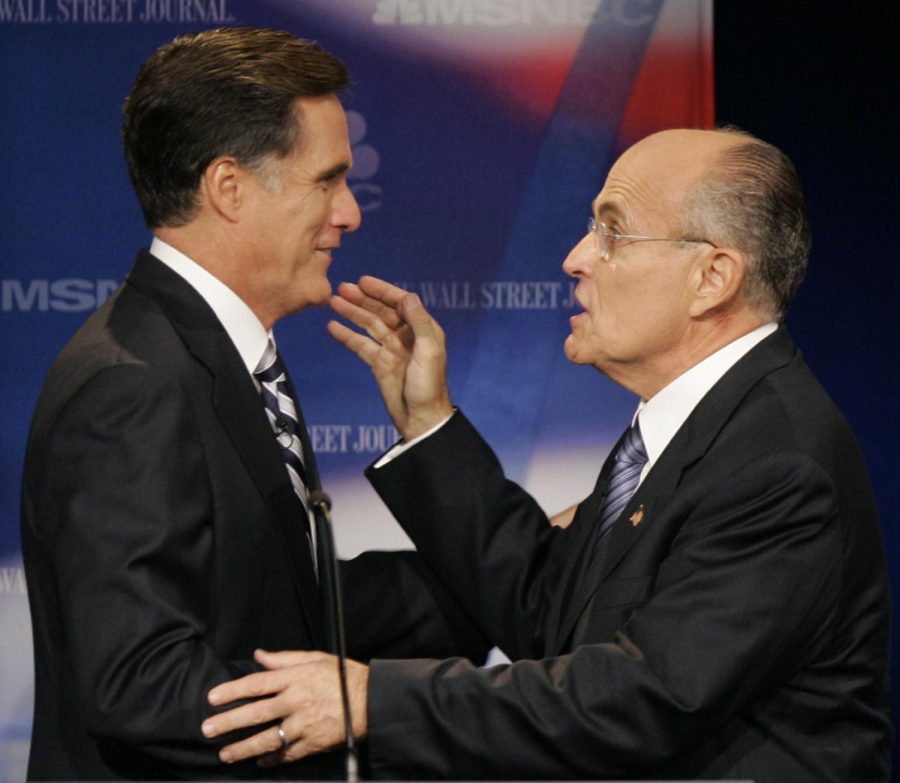 Mitt+Romney%2C+left%2C+and+Rudy+Giuliani+talk+to+each+other+after+the+GOP+Presidential+candidates+debate+in+Dearborn%2C+Mich.+on+Oct.+9%2C+2007+file+photo.+The+candidates+will+face+off+again+Wednesday.+%28AP+Photo%29