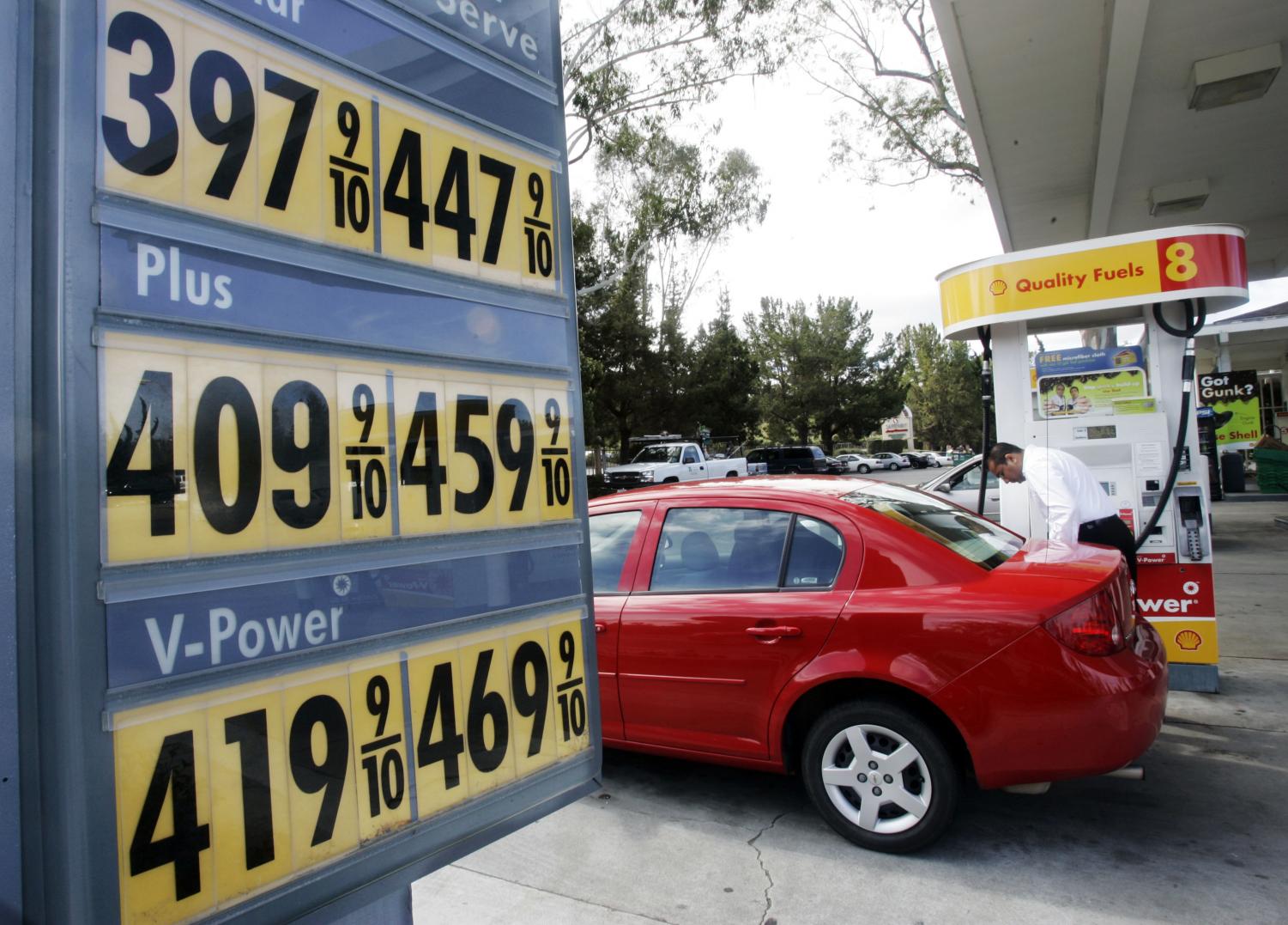 High gas prices are seen posted at a Shell gas station in Menlo Park, Calif. Across the country the costs of gasoline are soaring, including here in La Mirada.