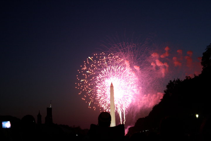 Fireworks brighten the night sky over the Washington Monument on Independence Day.