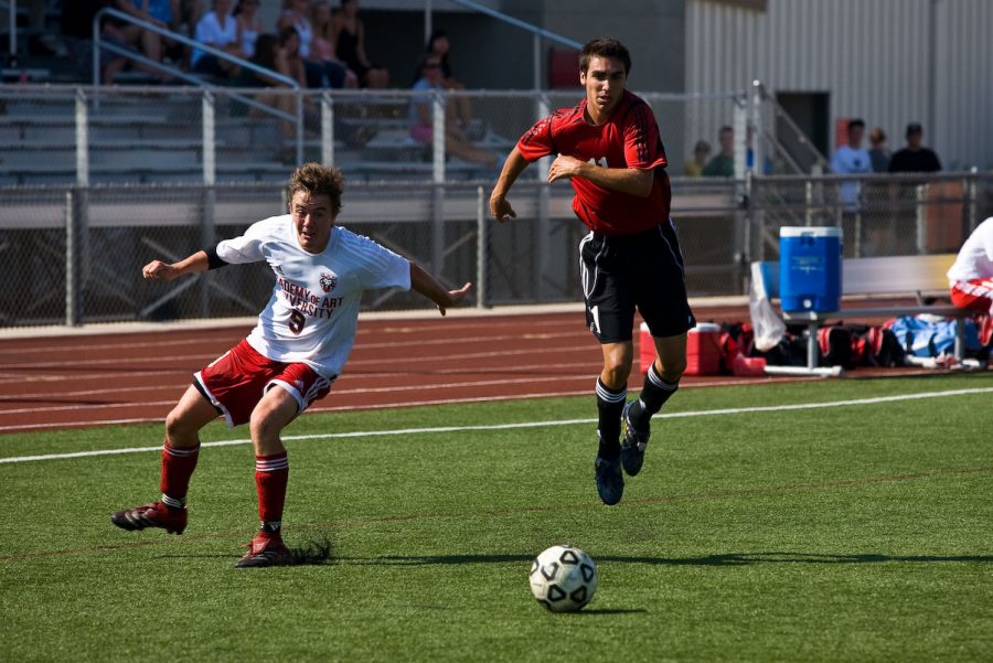 Freshman Marco Ruvalcaba hops around a defender to get to the ball. Photo by Mike Villa