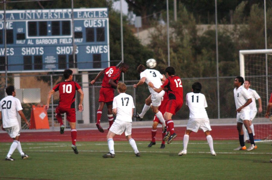 The Biola mens soccer team (in red) played the Biola alumni soccer team (in white). The alumni pulled out a win with a two goal lead over the Biola Eagles.