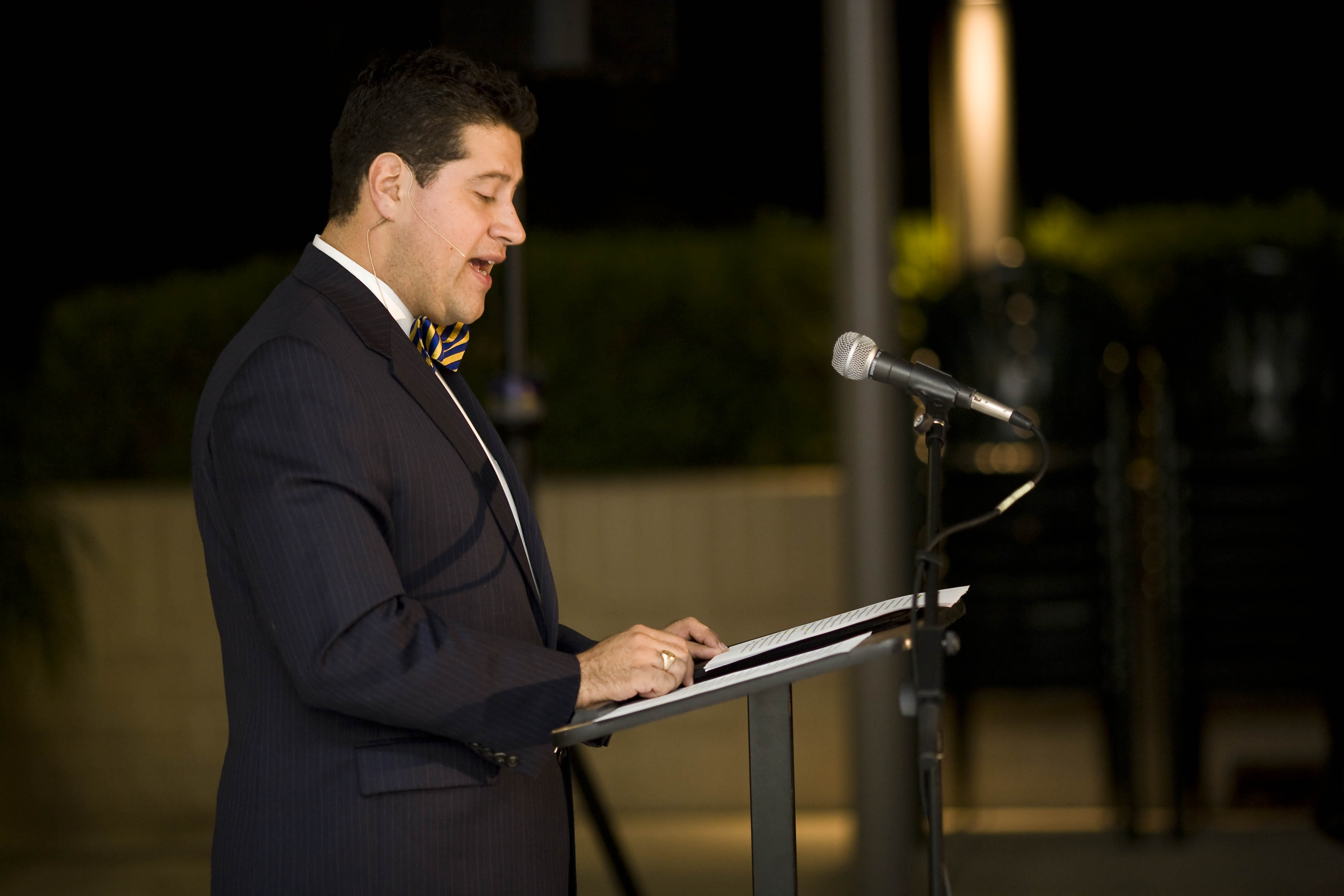 Regent University's chair of government Gerson Moreno-Riano lectures about faith and politics in the library courtyard Tuesday night.   Photo by Mike Villa