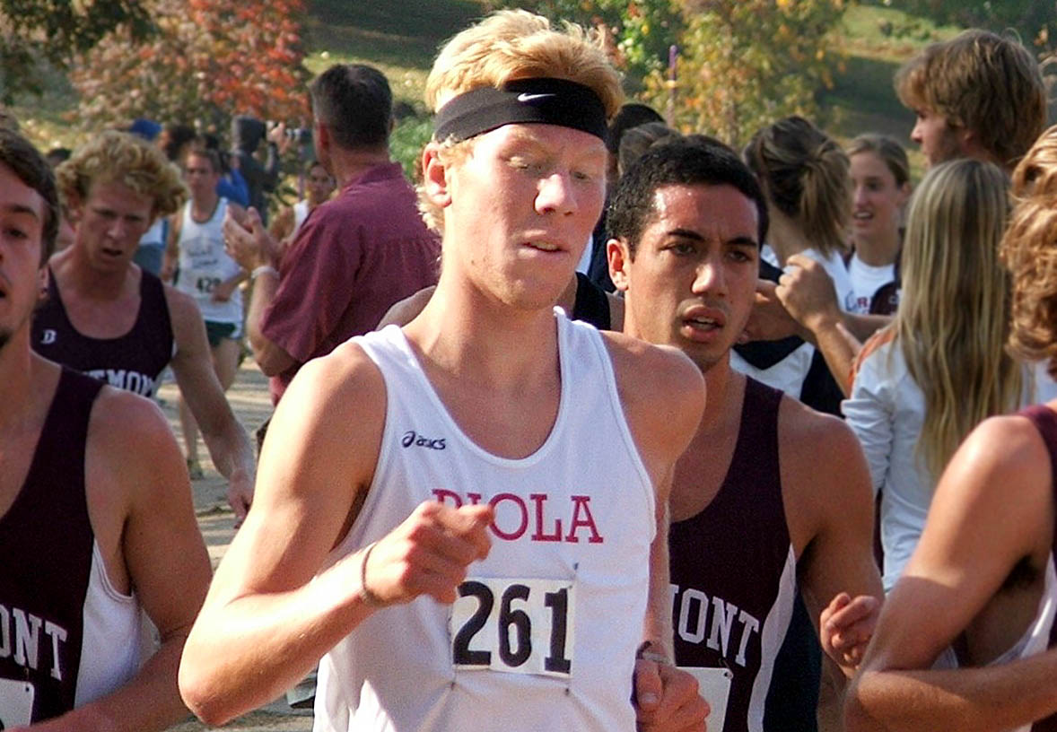 Junior Ryan Richert keeps pace ahead of Westmont runners at a meet.  Photo by Jeff Hoffman