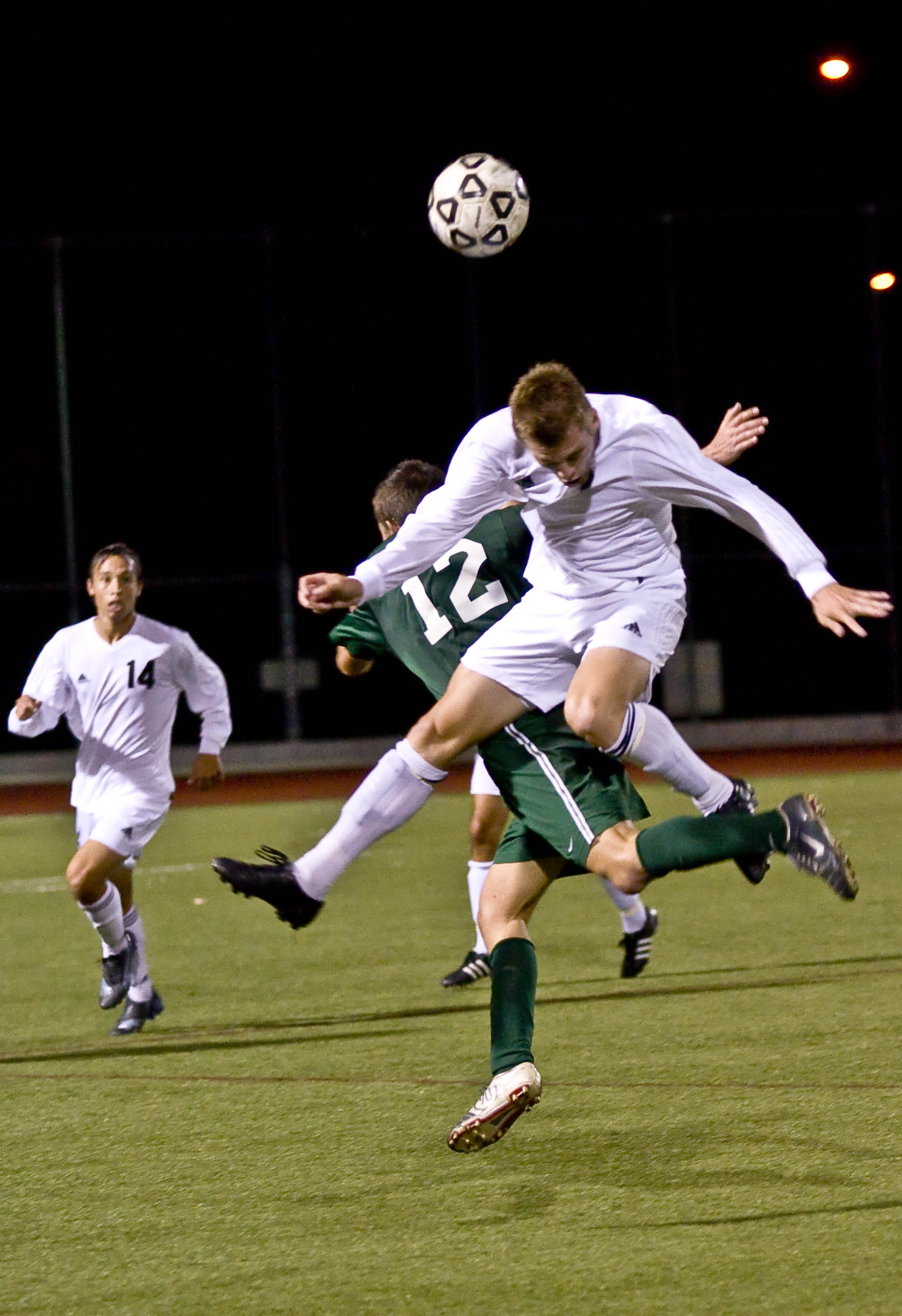 Jake Ravenscraft, Sophomore, fights to get the ball away from the Westmont opponent in the home game on Oct. 4.  Photo by Christina Schantz