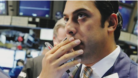 The DOW Industrial Average took a plunge Monday, losing a record 778 points.   Photo by AP Photo