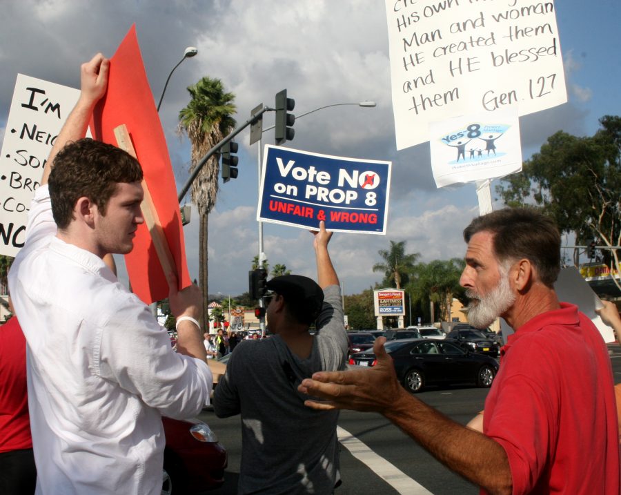 On Nov. 2, protesters along an intersection of Beach Blvd. speak out for their position on Proposition 8, regarding same sex marriage in California.   Photo by Claire Scholl
