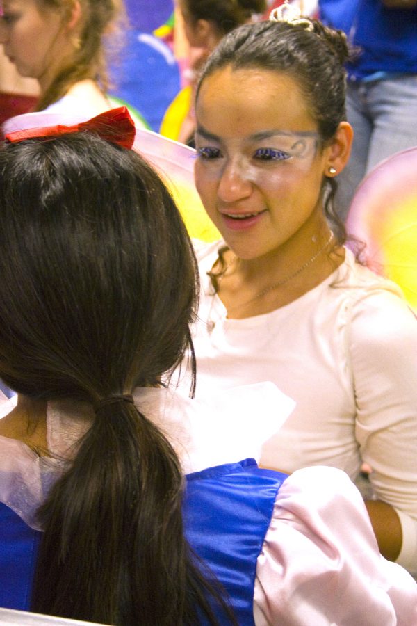 Elizabeth Martinez, freshman, was in charge of the face painting at the Halloween event hosted by Alpha Chis residents the night of Oct. 31.  Photo by Christina Schantz