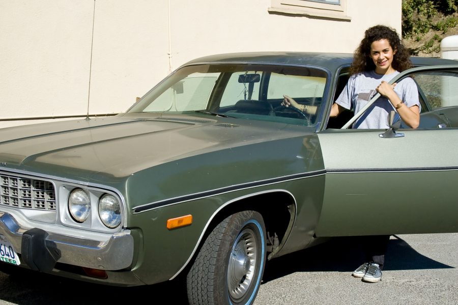 Senior Danika Dahlin got her 1973 Plymouth Satellite from a friend of her dad's who was a professional stunt double. It once had white flames painted down the side, but her mom made her paint over them.  Photo by Christina Schantz