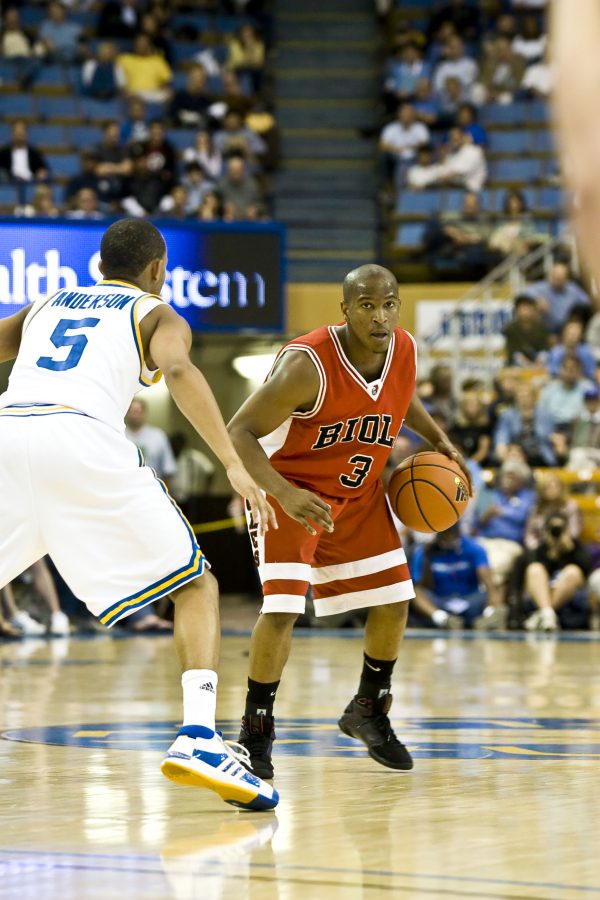 Marlon King, junior, plays against the UCLA team in the exhibition game on Nov. 7.   Photo by Christina Schantz