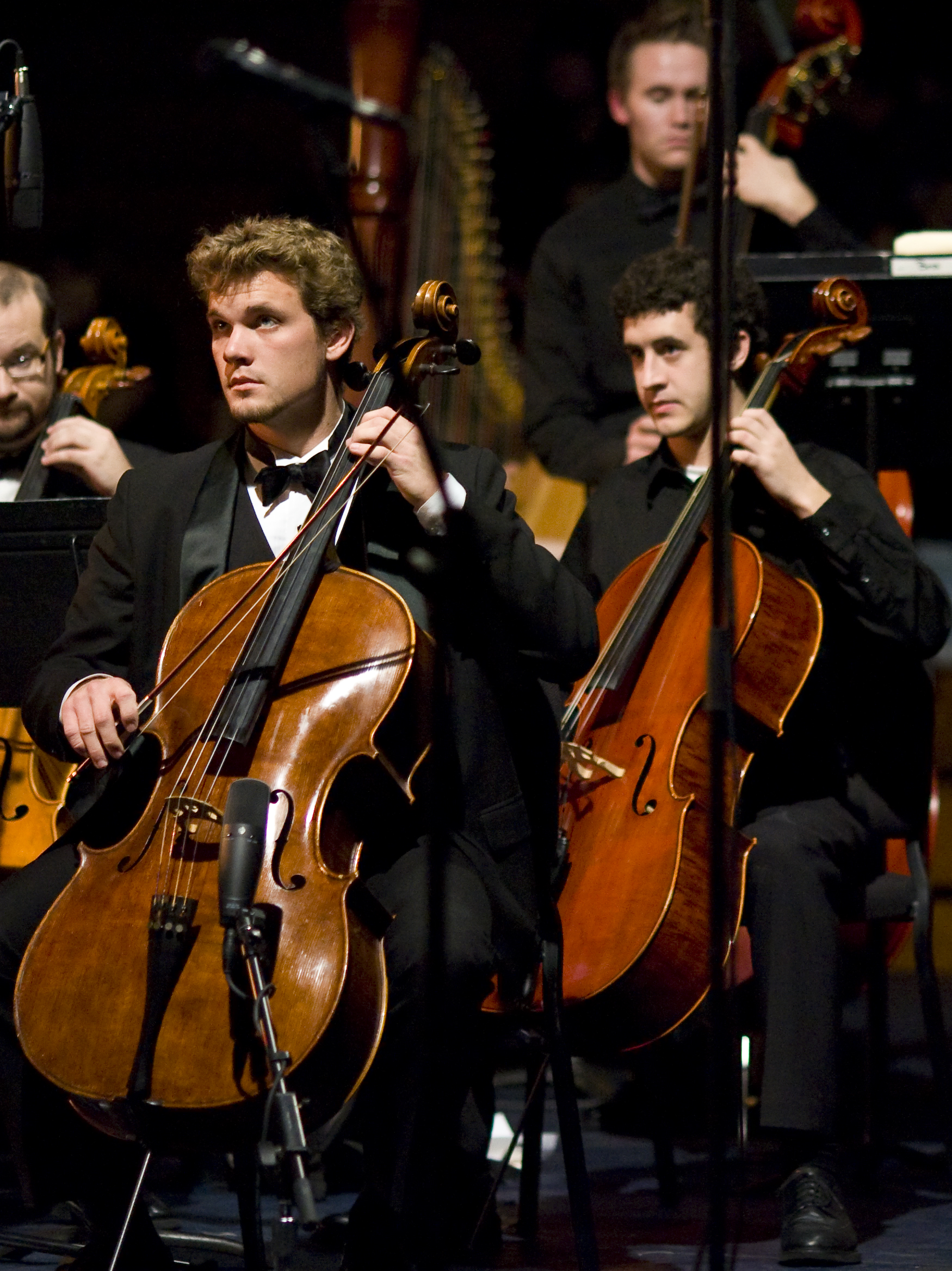 Sophomore Nathan Cottrell pays close attention to Marlin Owen, his conductor, while playing with the Biola Symphony Orchestra.