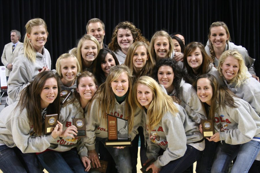 The women’s volleyball team shows off the plaques they brought home after taking 3rd place in the NAIA national championships in Sioux City, Iowa last week.  This is the team’s second consecutive showing at the national tournament. Photo by Courtesy: Jeff Hoffman