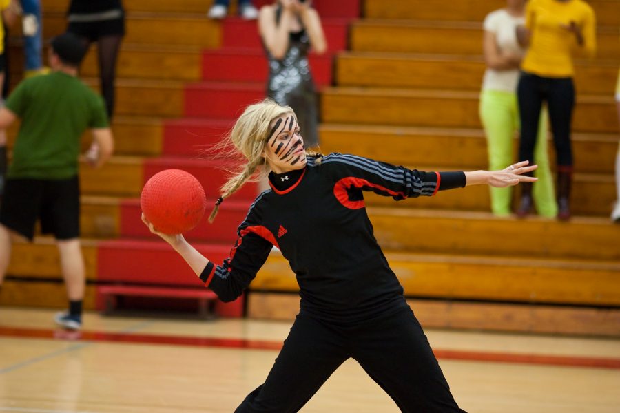 Katie Owen, freshman, participates in the dodgeball game in her Horton black-out attire. Photo by Mike VIlla