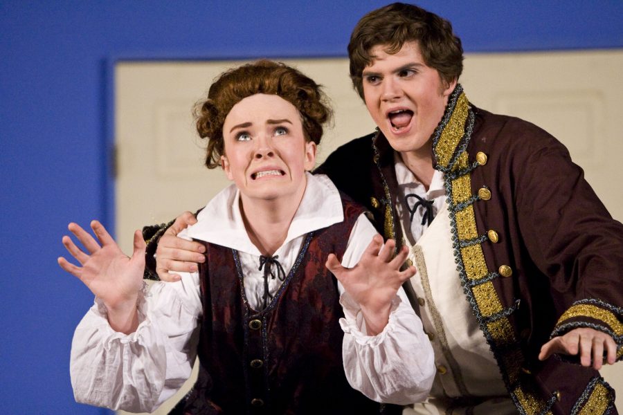 In this years production of Mozarts opera The Marriage of Figaro, Kirsten Johnson, sophomore, plays an adolescent boy Cherbino, and Arnold Geis, sophomore, plays the lead figure Figaro.   Photo by Kelsey Heng