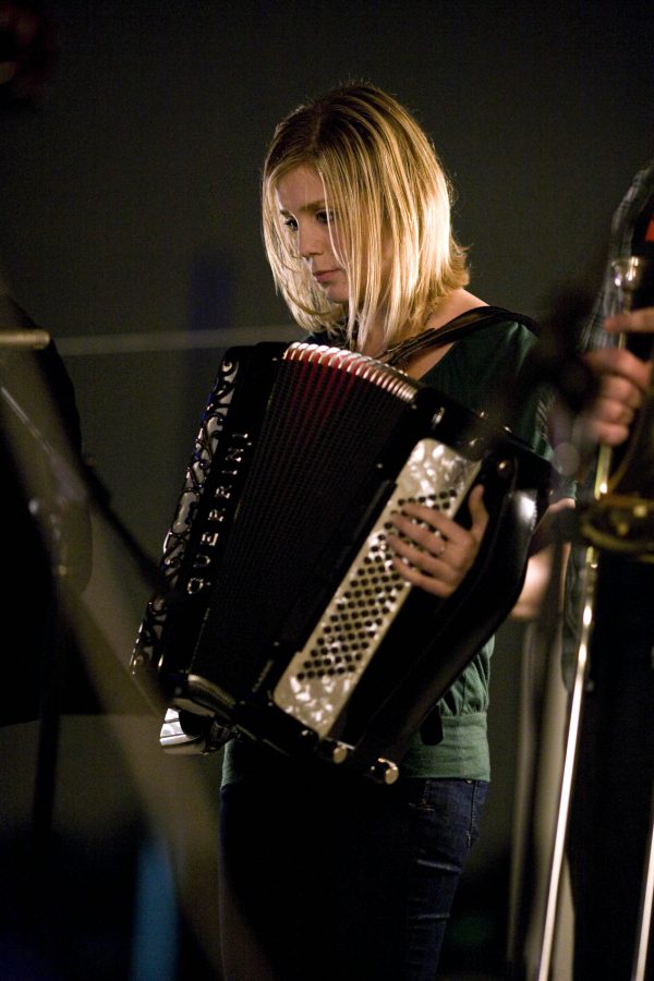 Sophomore Linzy Spann, member of Leda and the Swans, played the accordion with the band at the Eddy on Thursday, Feb. 26.  Photo by Mike Villa