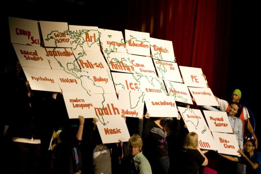 During a Thursday session, the Parade of Majors took place, in which students representing their specific major walked down the aisle of the gymnasium and then they all came together to form a map of the world. Photo by Bethany Cissel