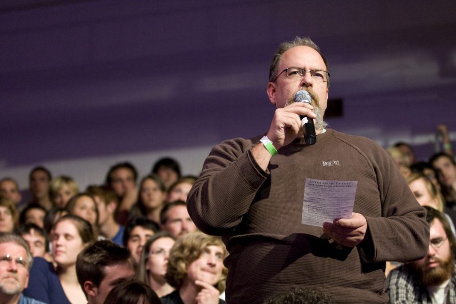 Randall Higgins, 1980 Biola alumni from Pasadena, CA, took advantage of his former student status to ask a question of the debaters.  *Photographer: Kelsey Heng*