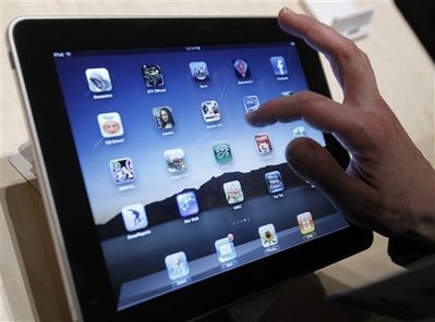 FILE - In this Jan. 27 file photo, the iPad is shown after it was unveiled at the Moscone Center in San Francisco. (AP Photo/Marcio Jose Sanchez)