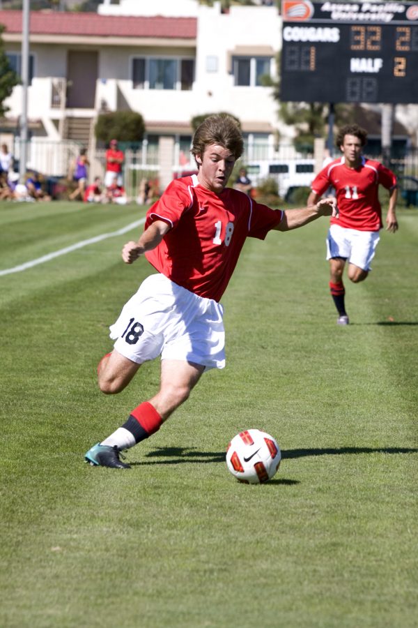 Freshman Dylan Wingrove prepares to fire a shot at the Azusa Pacific goal in the first half of the Eagles' 1-0 loss at APU. Wingrove took one shot in 46 minutes of playing time on Saturday afternoon. BRAD MIERSMA/ The Chimes