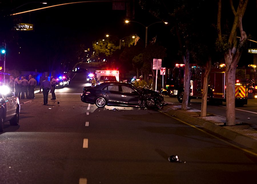 The corner of La Mirada Blvd and Oakwood Lane was blocked off Tuesday night after a car accident involving a sheriff. City firefighters, police, and campus safety were involved in the scene. No Biola students were confirmed to be involved. Photo by Kelsey Heng