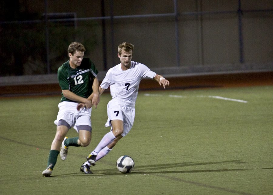 Senior Jake Ravenscraft makes a move on the Point Loma defense. The Eagles lost 2-1 in overtime against the GSAC foe. Photo by Brad Miersma