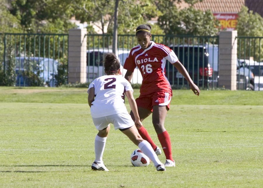 Freshman Jessica Austin dribbles through a defender during the Eagles Golden State Athletic Conference match against Azusa Pacific University on Saturday. Austen started and played 63 minutes in the 3-1 loss to the Cougars. Brad Miersma/ THE CHIMES