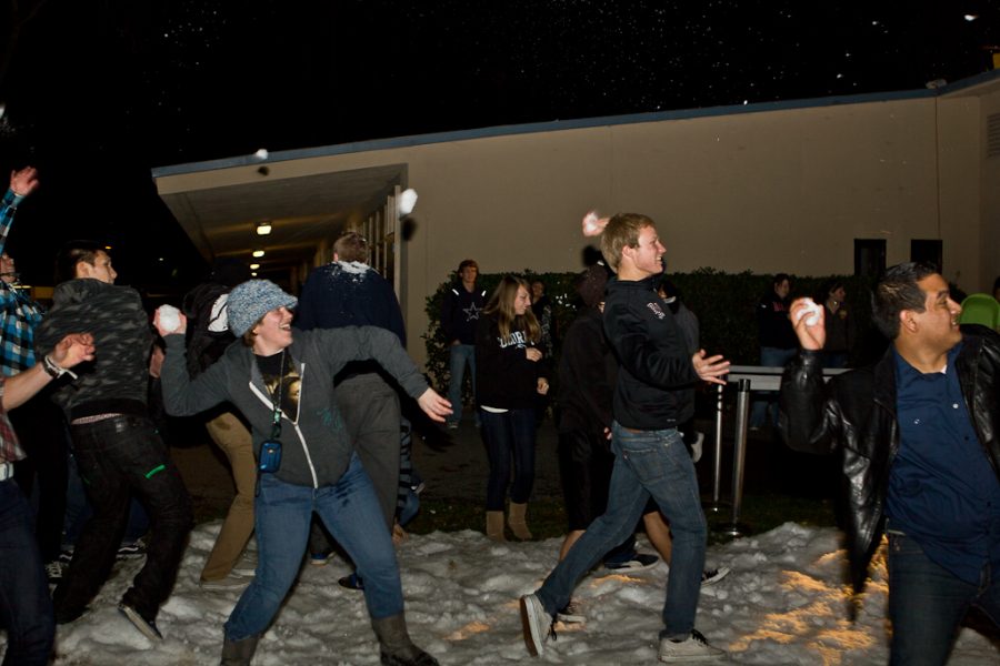Students toss snowballs at each other during the Boy Meets Girl: Snow On McNally mixer event on Thursday, February 17, 2011.  | Job Ang/THE CHIMES