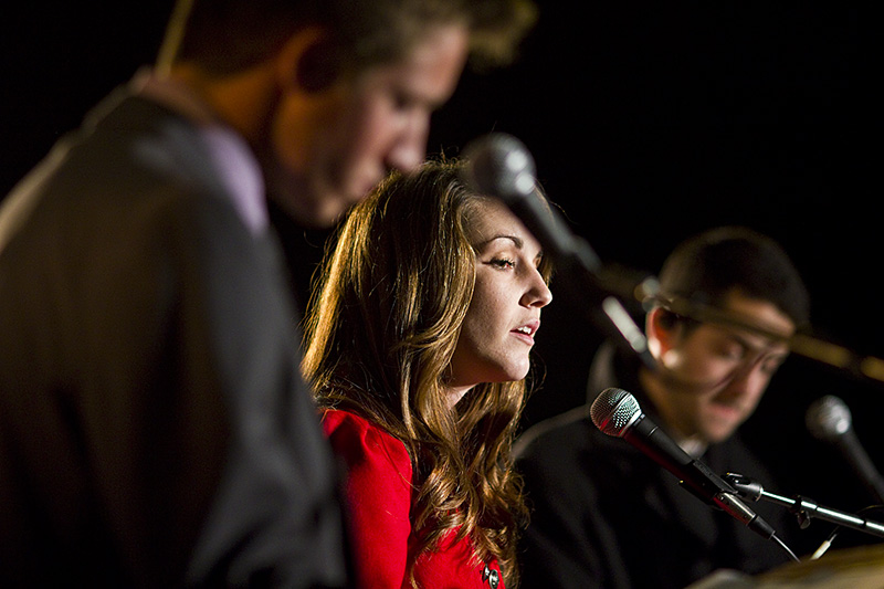 Kelsey Seitz, campaigning with Kevin Zimmerman, answers the moderators question beside her running opponents at the election debate Tuesday night.  | Job Ang/THE CHIMES