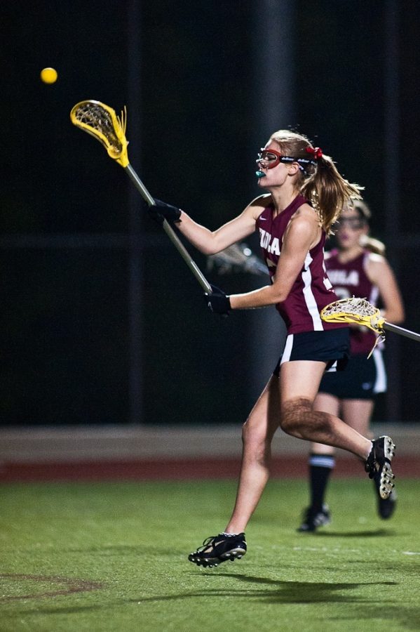 Courtney Cocoris, team co-president and coach, led the Biola Womens Lacrosse team to an 11-4 match against Cal State Fullerton, gaining the most goals in a game this season. | Mike Villa/THE CHIMES
