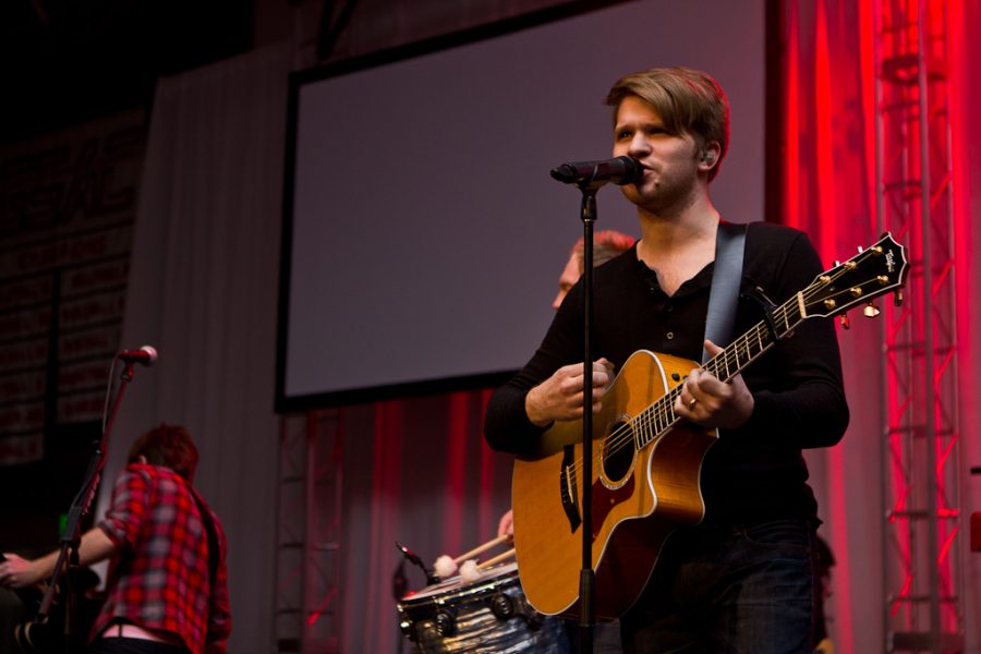 Singer Elias Dummer leads worship before Session Five of Missions Conference on Thursday, March 17, 2011. | Job Ang/THE CHIMES