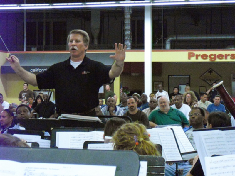 Robert Feller, Symphonic Winds Conductor, directs a show at the Salvation Army in Bell, Calif. | Photo courtesy of Carson Leith