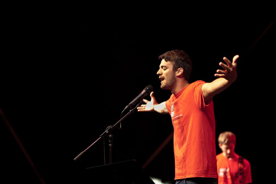 Junior Patrick McCann speaks during an interlude at Singspiration on Sunday evening, August 21, 2011. | Job Ang/THE CHIMES
