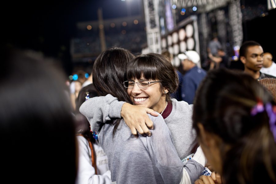 A Biola Student embraces a new believer at the Harvest Crusade on September 10, 2011. Almost 6,000 people were brought to the Lord that night.  | Job Ang/THE CHIMES