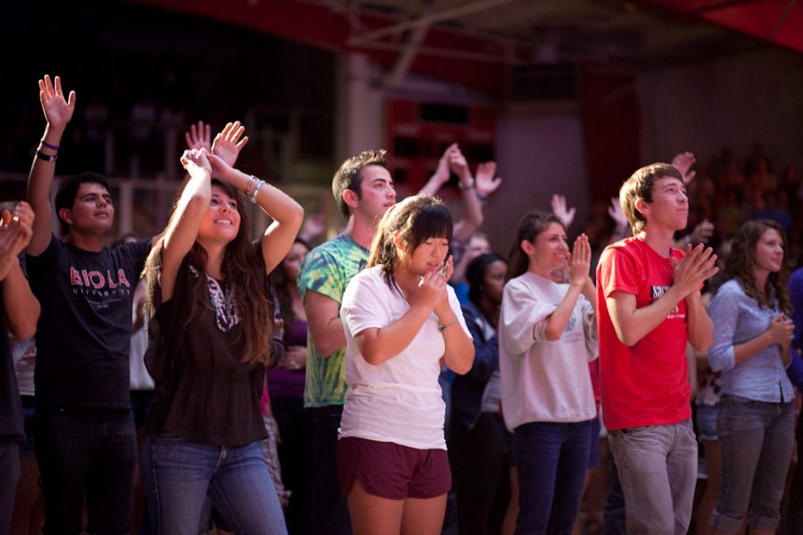 Students sing in worship during the 9/11 Singspiration service on Sunday night, September 11, 2011. | Job Ang/THE CHIMES