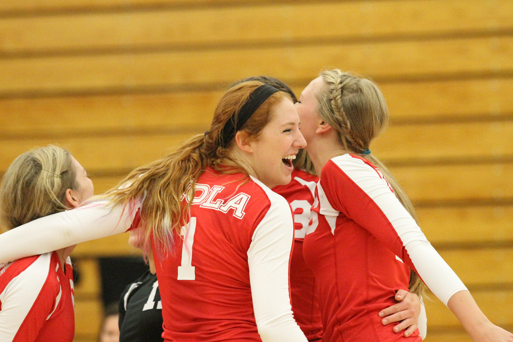 Junior Rachel Buckley celebrates with teammates during Biola's victory on Tuesday night over Pt. Loma Nazarene. | Tyler Otte/THE CHIMES