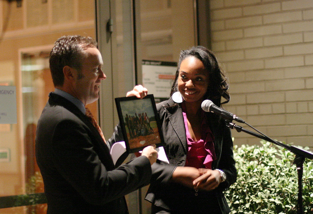 6th Street PR hosted a book completion celebration in honor of the students who created and published a book about baseball and the Dominican Republic though the Journalism Department on Nov. 10, 2011. Biola 6th Street PR's staff member and Biola senior, Sheena Boyd presented Dr. Corey with a photograph of the team that traveled to the Dominican Republic over spring break in 2011. | Katie Juranek/THE CHIMES