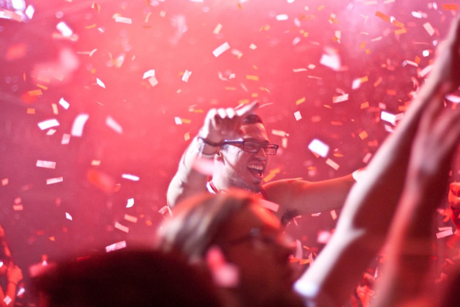 Per tradition, red and white confetti is blasted into the air, closing the annual Midnight Madness event. | Katie Juranek/THE CHIMES