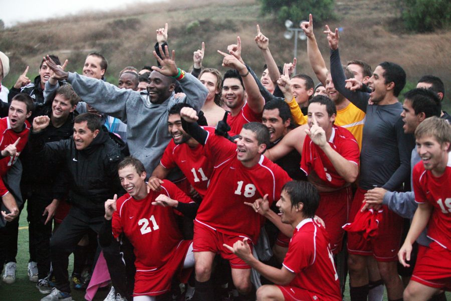 The Biola Mens soccer team displays the number one sign because of their triumph over Concordia University at the GSAC finals on Nov. 12, 2011. | Ashley Jones/THE CHIMES