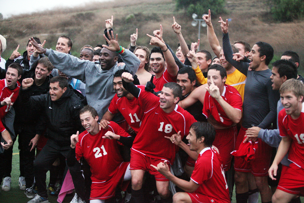 The Biola Men's soccer team displays the "number one" sign because of their triumph over Concordia University at the GSAC finals on Nov. 12, 2011. | Ashley Jones/THE CHIMES