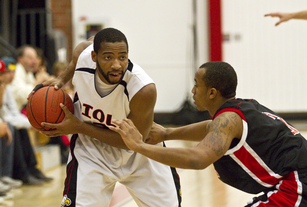 Given Kalipinde fights off a defender at the Nov. 14, 2011 game against Holy Names. Biola lost a close game of 65-67. | Tyler Otte/THE CHIMES