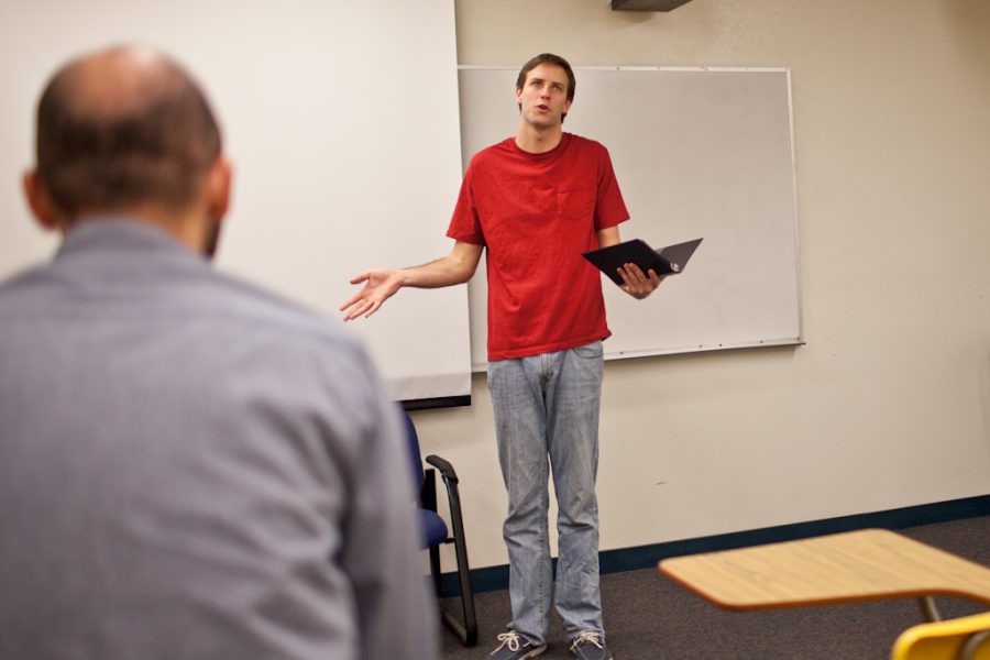 Nick Shorts practices a story during speech and debate club at their weekly meeting. | Ashley Jones/THE CHIMES