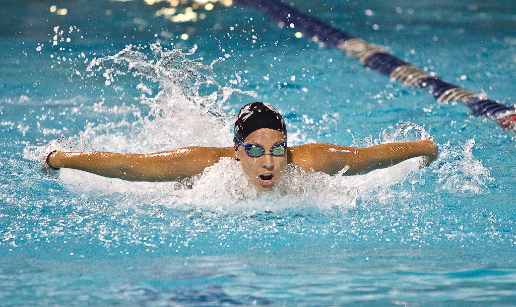 Senior Brittney Rosania competed in a butterfly event at the PCSC meet Wednesday, Feb. 8. The women’s team scored 313 points to place 11 out of 13 teams. | Olivia Blinn/THE CHIMES