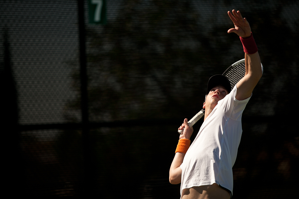 Sophomore Isaiah Pekary, also known as "Big Bird" among the players, serves during a singles match against Azusa Pacific on Saturday, March 10, 2012. | Ashley Jones/THE CHIMES