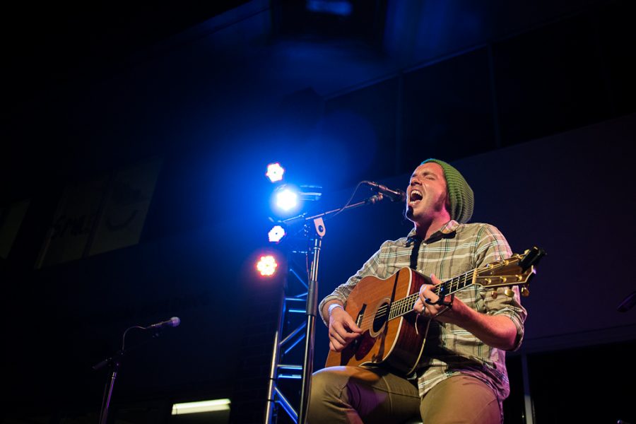 Looking out upon a sea of over 1,000 faces, Josh Garrels plays for a captivated crowd at the Eddy. | Olivia Blinn/THE CHIMES