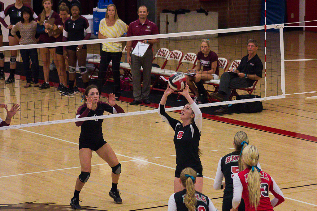 Junior Gracee Gallarda prepares for a set in Saturday night's game against Westmont College. John Buchanan/THE CHIMES