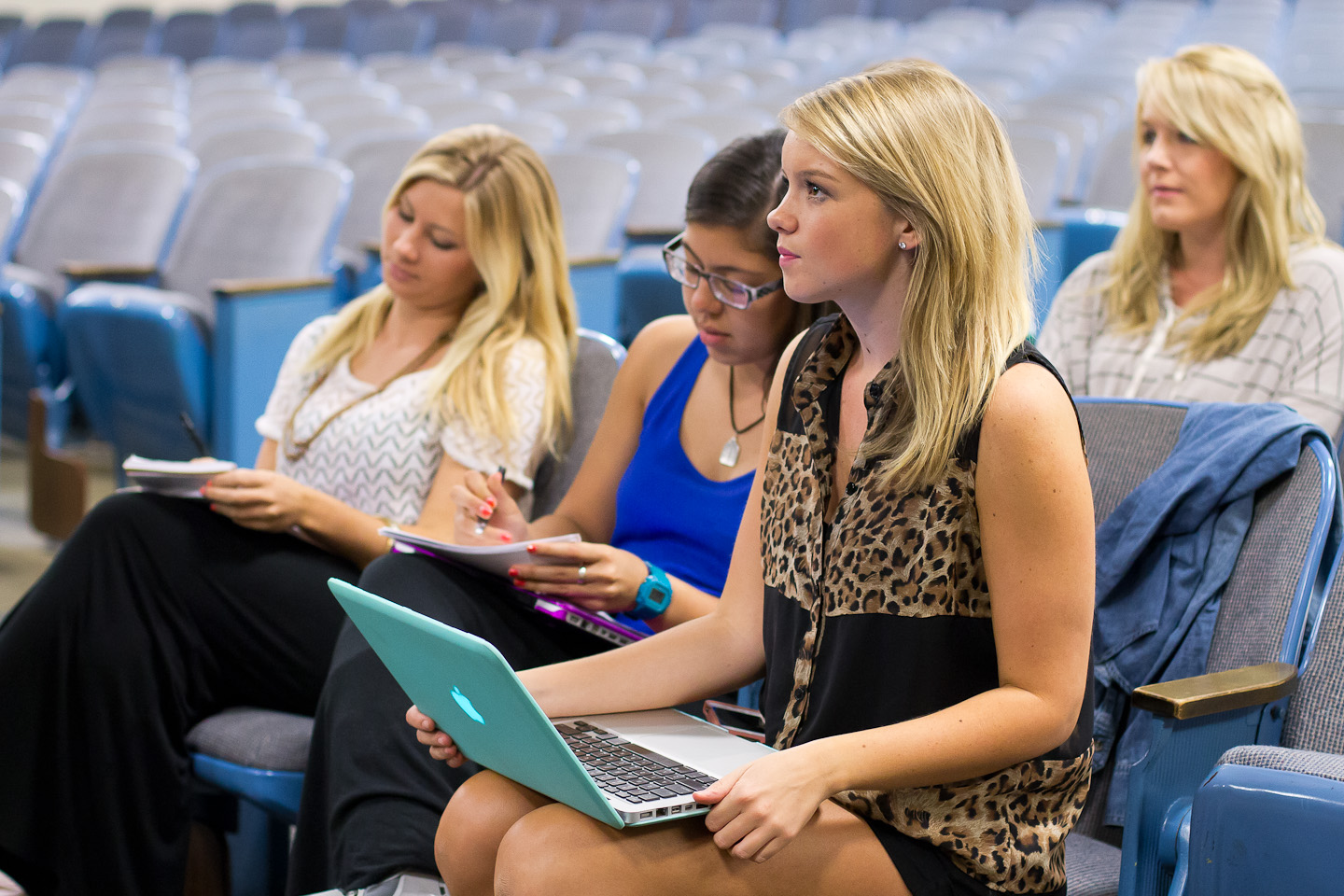 Staying positive throughout the 5 hours of auditions, senior Social Events Coordinator Michelle Orgill encourages students as they try out for Punk 'n' Pie. | Emily Arnold/THE CHIMES