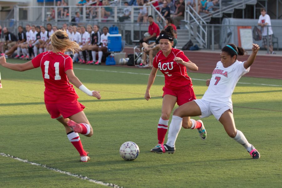 Senior Stephanie Cubias fights for the ball against Arizona Christian University Wednesday night. The women improved to 5-4-1 overall with a 2-1 record in GSAC play. | John Buchanan/THE CHIMES