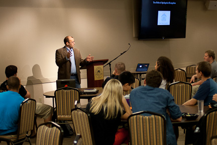 Jason Oakes, a biblical studies professor, speaks on worldviews at the Apologia luncheon on Wednesday. | Grant Walter/THE CHIMES