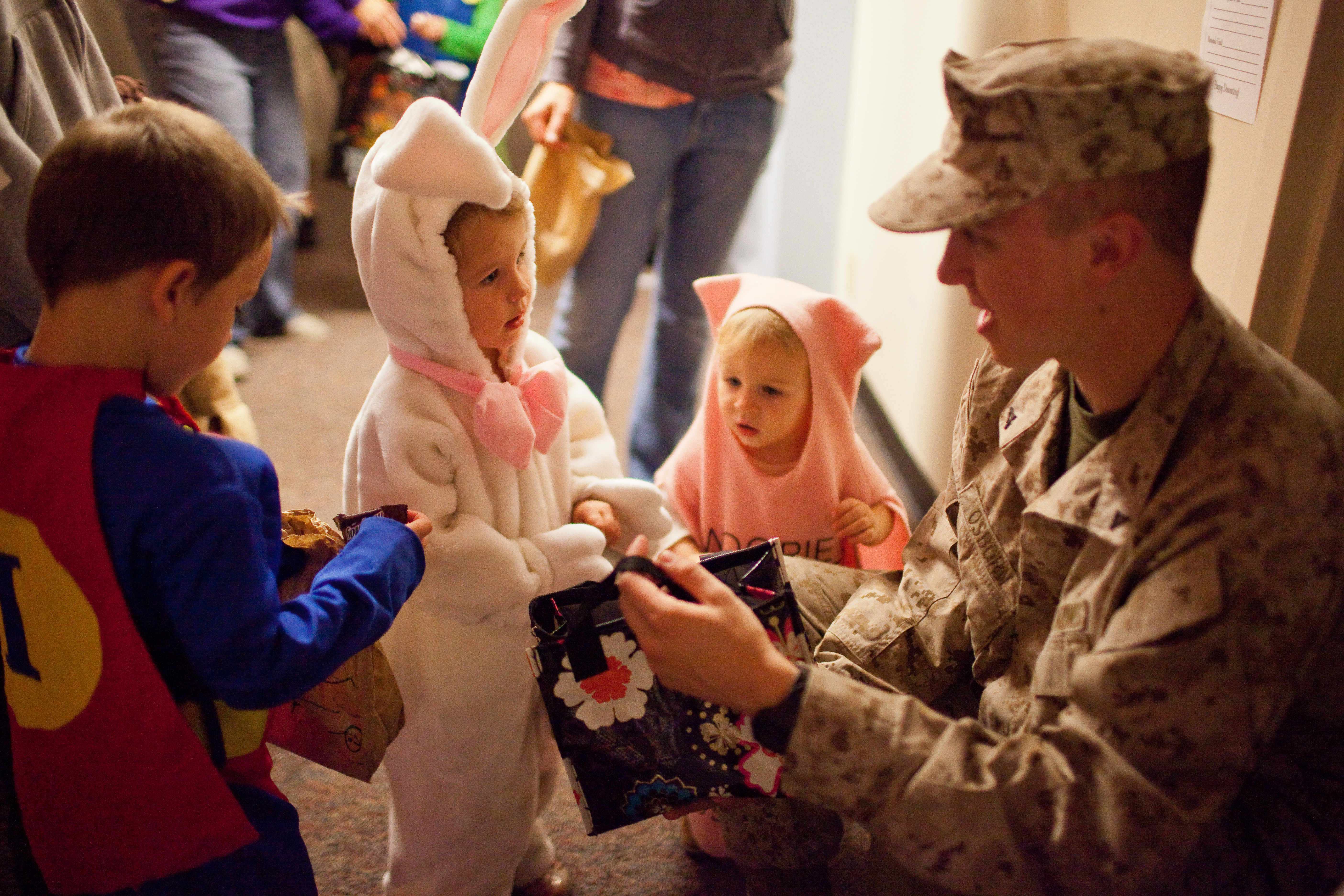 Adella and Isaac Hameson share treats with sophomore, christian ministry major Cameron Osborn at Candyland on Oct. 31, 2011. | Job Ang/THE CHIMES [file photo]